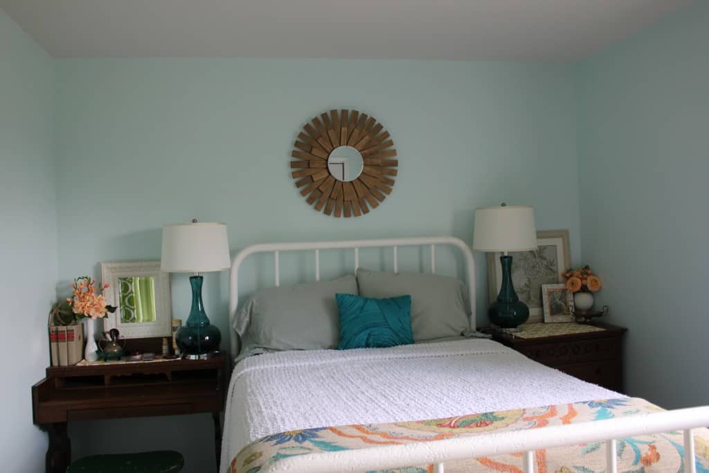metal bed with a desk and a dresser on either side, chenille bedspread, turquoise lamps and a mid-century modern sunburst mirror hung above - Mid-Century Modern Mirror - Life Full and Frugal