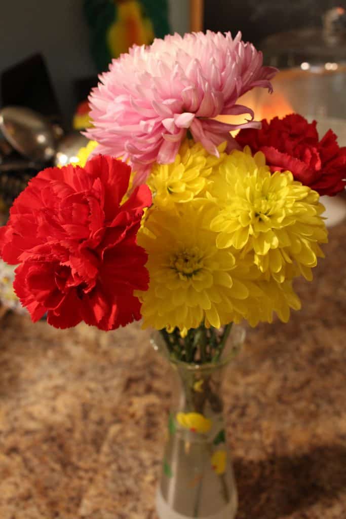 Life Full and Frugal/bouquet of red carnations and pink and yellow mums