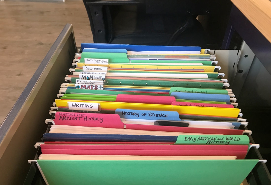 hanging file folders used to organize homeschool curriculum - Homeschool Classroom Overhaul and Tour - Life Full and Frugal