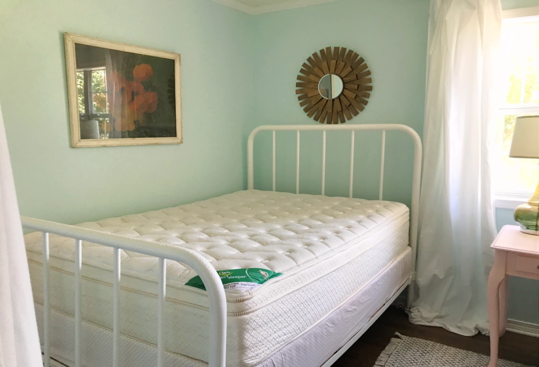 a stripped bed to be cleaned with essential oil cleaner life full and frugal