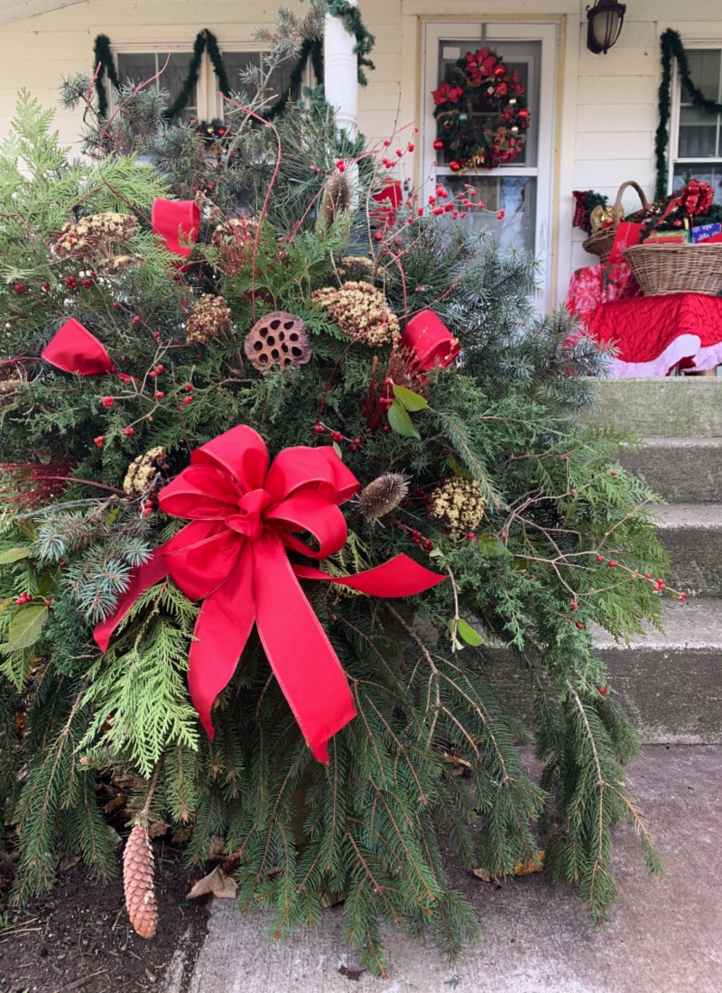 a christmas evergreen porch pot life full and frugal
