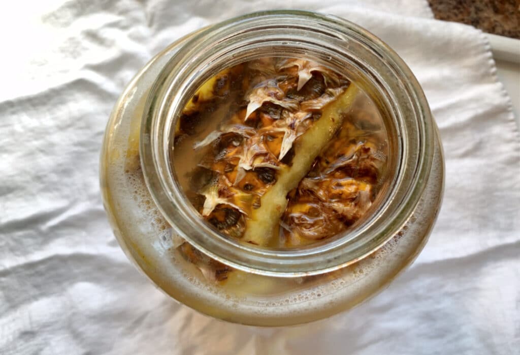 a jar of tepache fermenting life full and frugal