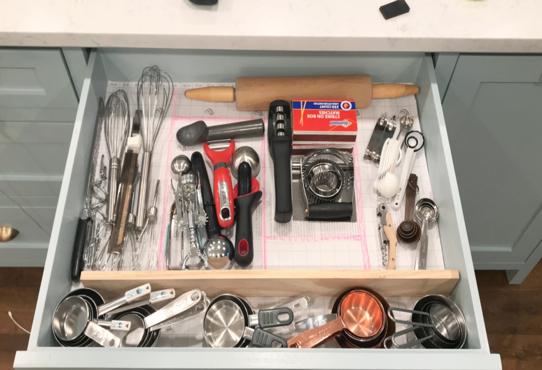 kitchen utensil drawer with utensils laid out to plan the custom diy dividers - Frugal Custom Drawer Dividers - Life Full and Frugal