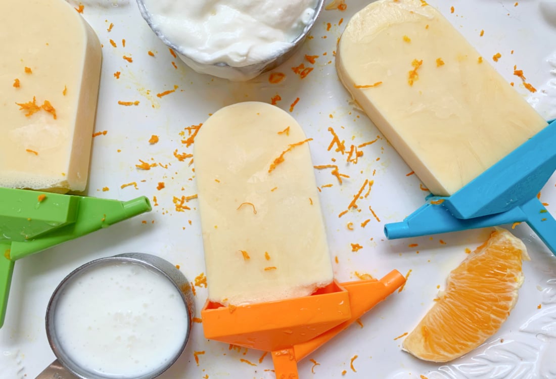 orange dreamsicle homemade popsicles with orange zest and yogurt - Probiotic Yogurt Dreamsicles with Orange and Vanilla - Life Full and Frugal